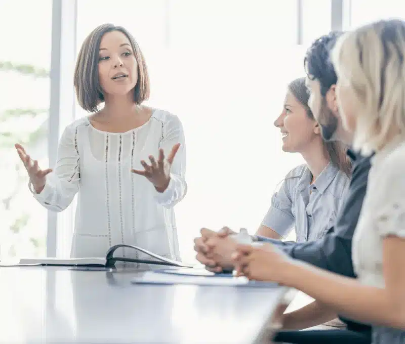 assertive woman of impact speaking in public